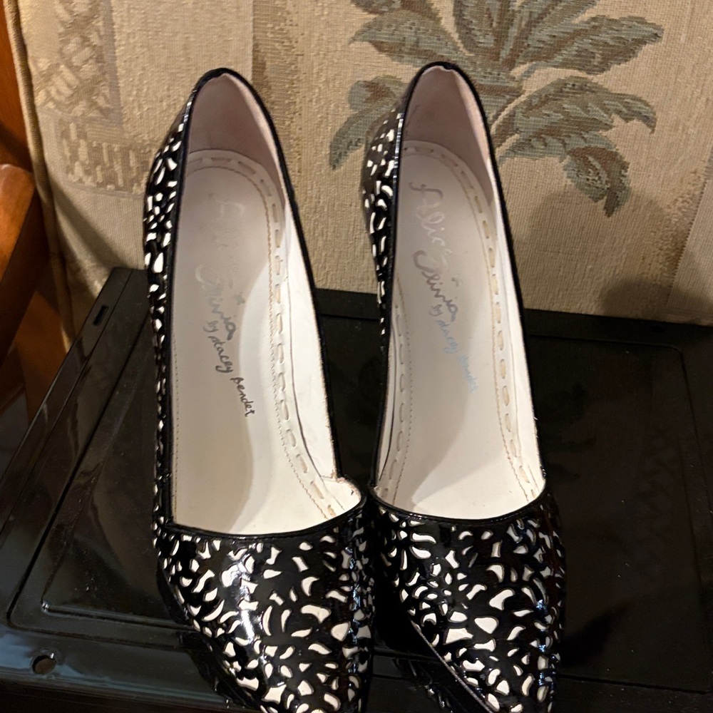 Black and White Laser-Cut Pointed Toe Pumps